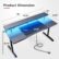 GTRACING 55″ Gaming Desk with Power Outlets, RGB LED Lights, Ergonomic Carbon Fiber Surface, Monitor Stand, and Accessories